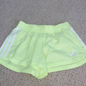 Neon green adidas athletic shorts